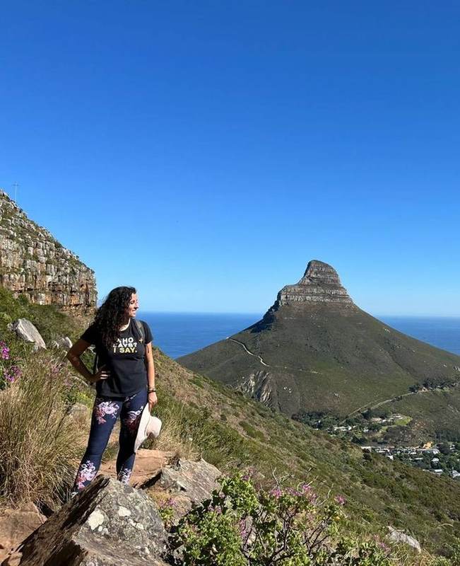 Mel hiking Table Mountain with Lion's Head view — Cape Town private guide